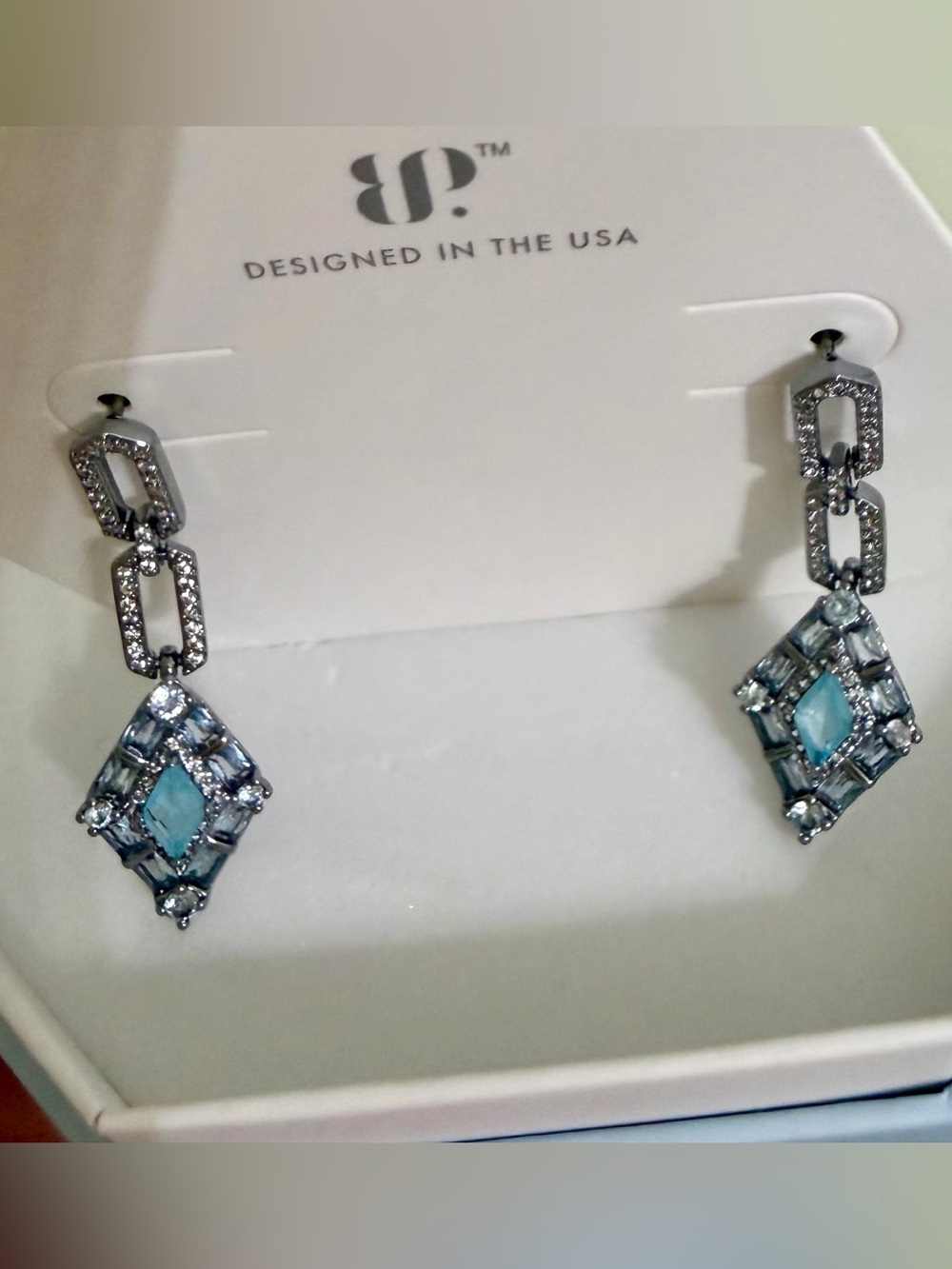 BP Hematite Drop Earrings with baby sky blue topaz